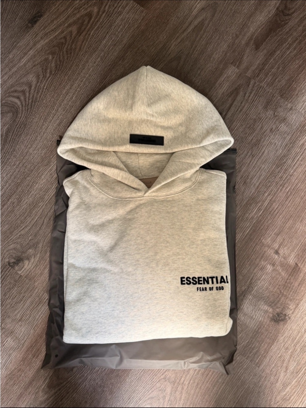 Fear of God ESSENTIALS Light Gray Hoodie with Chest Logo